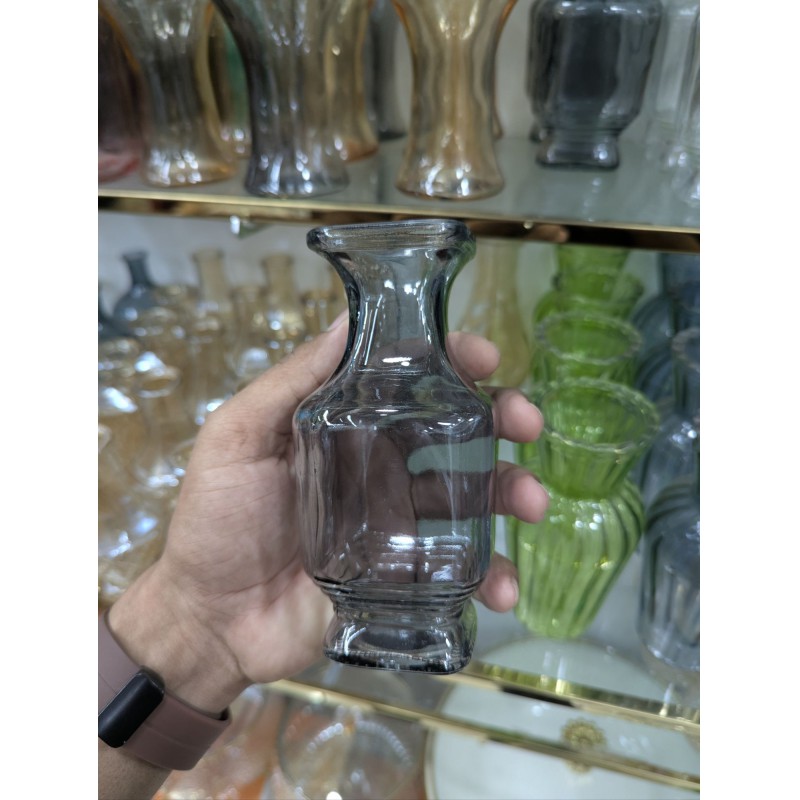 Picture of Elegant Moira clear glass hand-tied flower vase with bulbous body and flared rim, perfect for wedding centerpieces, minimalist home decor, or displaying beautiful fresh floral arrangements and small aesthetic flower bouquets.-Multicolor