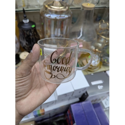 Picture of Clear Borosilicate Glass Coffee Mug with Gold Good Morning Print, Heat Resistant Transparent Tea Cup for Hot and Cold Beverages, Lightweight Fireproof Breakfast Tumbler for Home Kitchen Use.-Multicolor