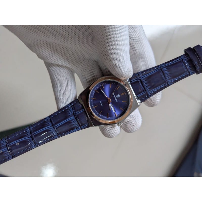 Picture of Men's Luxury Fashion Quartz Watch with Premium Blue Leather Strap, Waterproof Luminous Calendar Display, and Elegant Rose Gold Bezel Design for Sophisticated Business Professionalism and Everyday Classic Style Wear.-Blue
