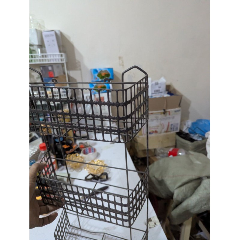 Picture of Maximize Your Living Space with this Durable 3-Tier Metal Wire Basket Storage Rack, a Multipurpose Freestanding or Wall-Mounted Organizer Ideal for Efficiently Storing Bathroom Toiletries, Kitchen Spices, and Essential Household Items.-Black