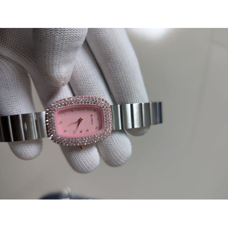 Picture of Luxury Women's Quartz Watch with Pink Dial and Silver Stainless Steel Band Featuring a Sparkling Rhinestone Bezel for Elegant Style and Precise Timekeeping Perfect for Any Special Occasion or Daily Wear.-Multicolor