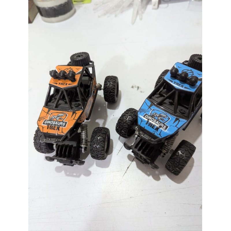 Picture of Durable  Pull Back Monster Truck with High Elastic Metal Shock Absorbers Manual Spring System Off-Road Climbing Car Toy for Toddlers Kids Boys Girls Ages 3 to 10 Years Old.-Multicolor