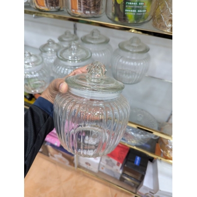 Picture of Premium Clear Ribbed Glass Storage Jar with Airtight Lid for Kitchen Pantry Organization Stylish Transparent Cookie Canister for Countertop Decorative Candy Pot Jar with Secure Seal for Preserving Food Freshness Quality.-Multicolor