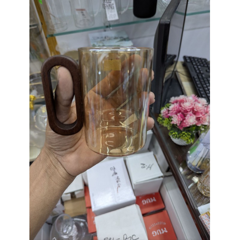 Picture of High Borosilicate Heat Resistant Glass Coffee Mug with Natural  Wood Handle Smoked  Tea Cup for Modern Kitchen Decor Minimalistic Style Drinking Glassware for Hot and Cold Beverages Daily.-Gold