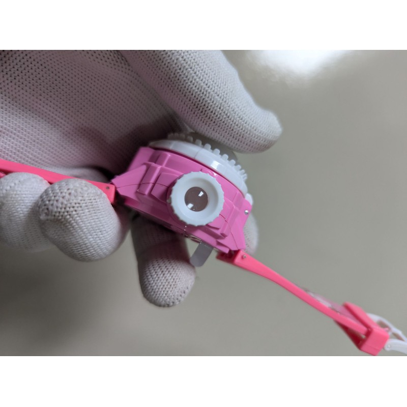 Picture of Hello Kitty Pink Digital Watch for Kids featuring a 3D Character Flip Cover Built-in LED Projector with 24 Cartoon Images and Adjustable Silicone Strap for Girls Birthday Gift and Daily Wear.-Pink