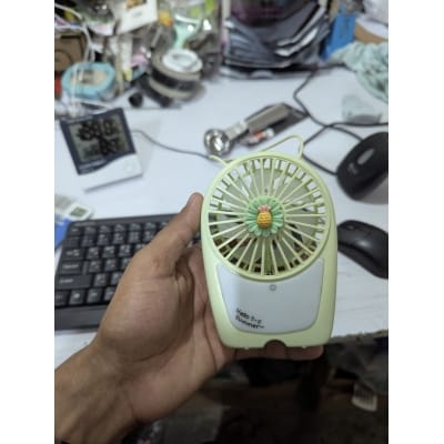 Picture of Hello Summer Portable Rechargeable Mini Fan with LED Light for Personal Cooling, Handheld USB Desktop Fan for Travel, Office, and Outdoor Use, High-Speed Silent Motor with Long-Lasting Battery Performance.-Multicolor