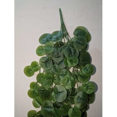 Picture of Premium Artificial Hanging Vine Plant for home decoration features realistic green leaves and long trailing stems perfect for adding a natural touch to your indoor living spaces without any daily maintenance.-Green