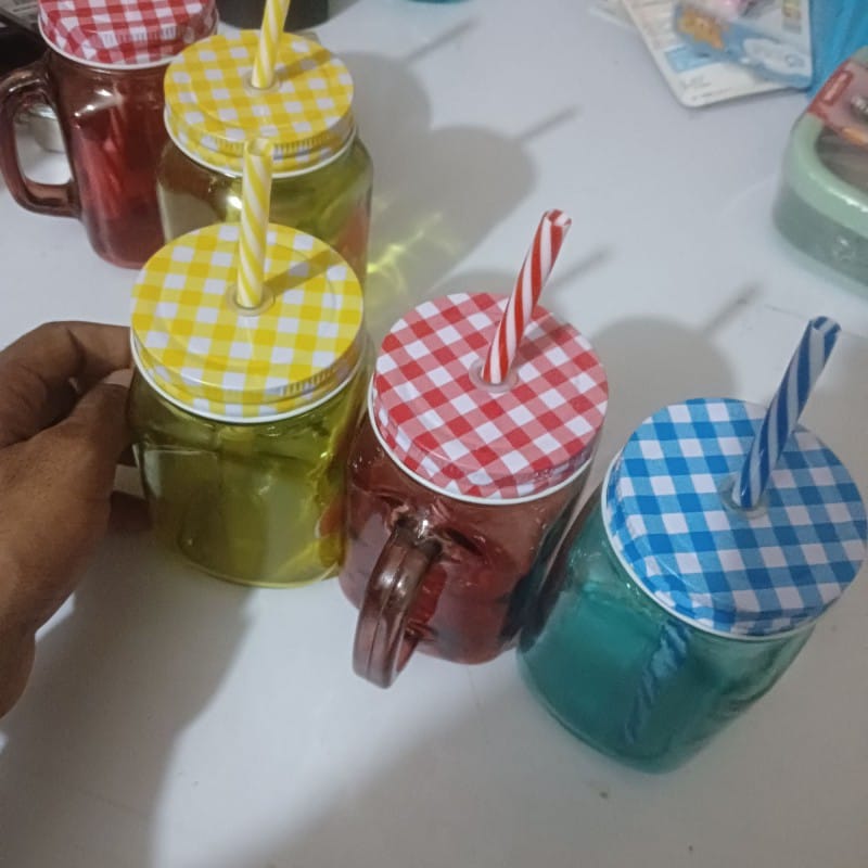 Picture of 1pcs red glass Mason jar mug with a handle, a checkered lid, and a striped straw, designed with print print body for drinking beverages. -Red