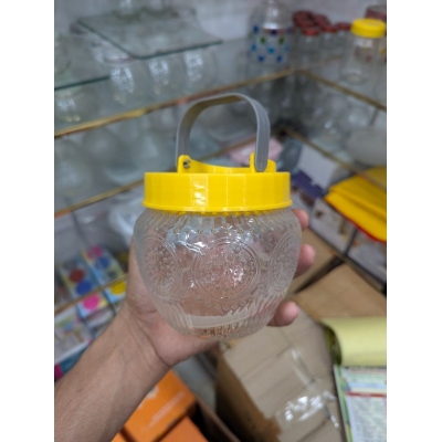 Picture of Premium Patterned Glass Kitchen Storage Jar with Airtight Yellow Lid and Metal Carrying Handle, Large Capacity Transparent Food Container for Fresh Cereal, Cookies, Snacks, and Pantry Organization for Modern Home Decor.-Multicolor
