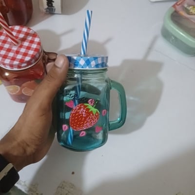 Picture of 1pcs yellow glass Mason jar mug with a handle, a checkered lid, and a striped straw, designed with print print body for drinking beverages. -Yellow