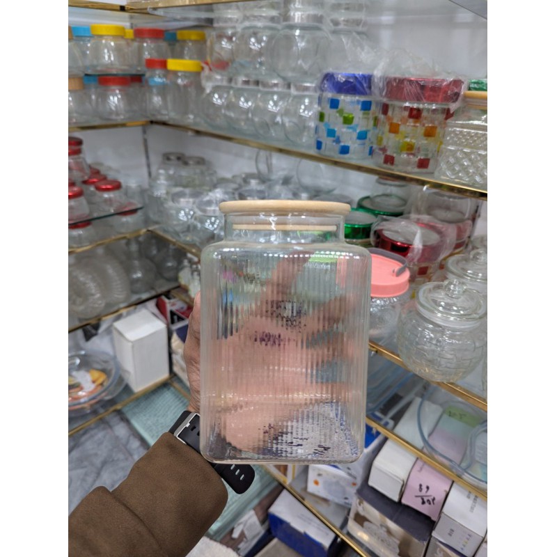 Picture of Airtight Glass Cookie Jar with Bamboo Lid for Kitchen Storage 1000ml Capacity Ribbed Textured Clear Glass Container Perfect for Storing Biscuits Sweets Dry Fruits Tea Leaves and Snacks Efficiently Online.-Multicolor