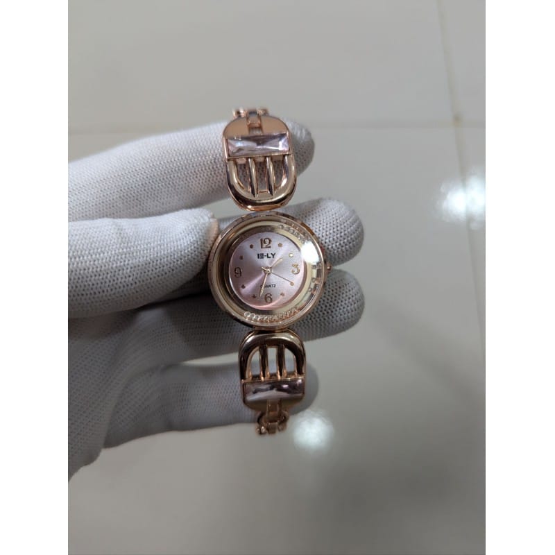 Picture of Luxury Rose Gold Bracelet Watch for Women featuring a Crystal-Studded Pink Dial with Quartz Movement, Decorative Horseshoe Links, and Premium Rhinestone Accents, Perfect for Elegant Evening Wear and Formal Gifting Occasions.-Multicolor