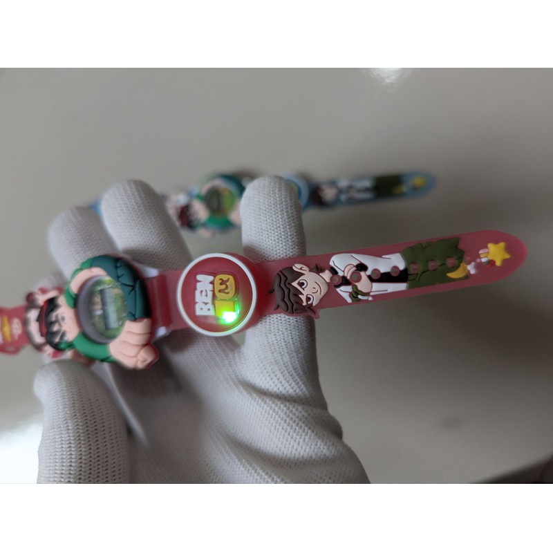 Picture of Ben 10 Kids Digital Watch featuring a unique rotating spinner design with colorful lighting and musical effects, perfect as a fun and functional toy-like wristwatch for boys and girls aged 4-12.-Red