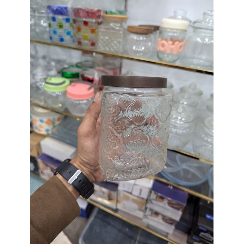 Picture of Premium Airtight Glass Cookie Jar with Decorative Brown Metal Lid for Kitchen Countertop Storage of Fresh Homemade Chocolate Chip Biscuits, Snacks, and Pantry Essentials with Retro Embossed Floral Pattern Style Design.-Multicolor