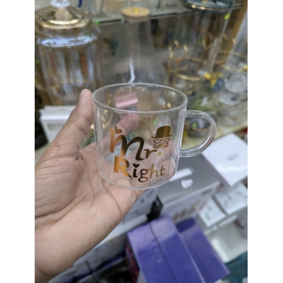 Picture of Elegant Mr. Right Transparent Glass Mug for Coffee and Tea Lovers Featuring Stylish Gold Typography with Mustache and Hat Graphics Perfect Gift for Anniversaries Weddings Birthdays and Special Couple Celebrations.-Multicolor