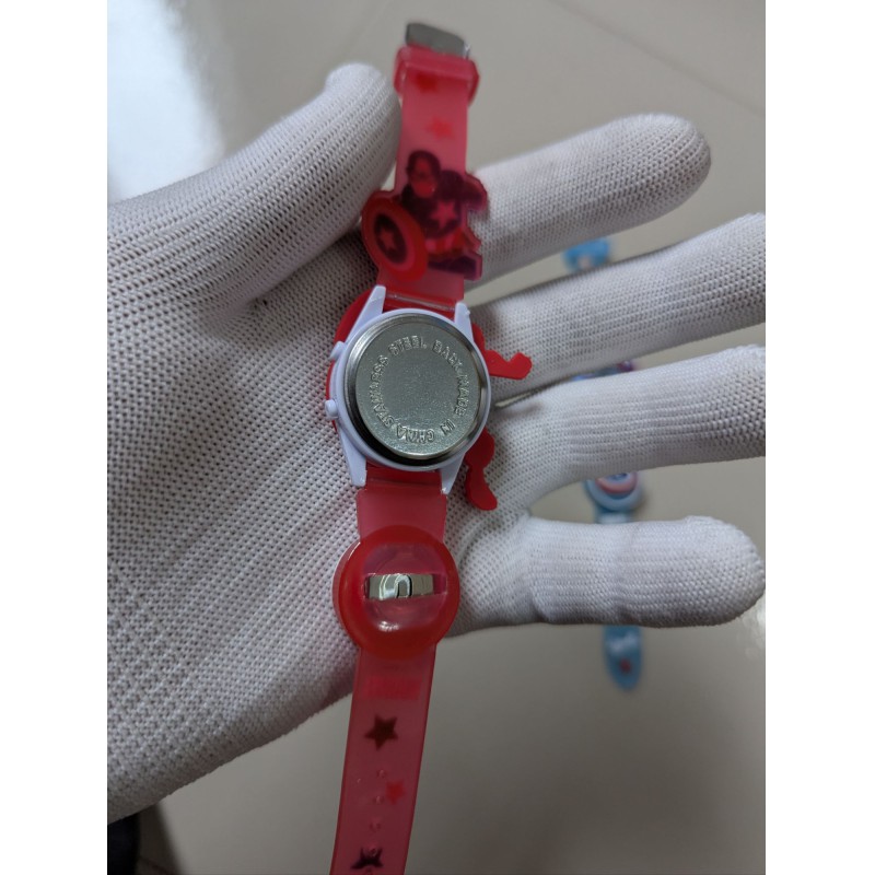 Picture of Marvel Captain America 3D Kids Digital Watch featuring Disco LED Flashing Lights and Built-in Music, Adjustable Pink Silicone Strap Superhero Character Wristwatch, Perfect Birthday Gift for Little Avengers Fans and Children.-Red
