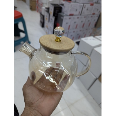 Picture of Premium Heat Resistant Borosilicate Glass Teapot with Natural Bamboo Lid, Crystal Top Knob, and Removable Spout Filter - 1000ml Large Capacity Stovetop Safe Clear Tea Kettle for Loose Leaf and Blooming Tea-Gold
