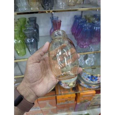 Picture of Elegant EGLO Kenyasi Glass Vase in Rose Pink with Iridescent Luster finish, perfect for home decor centerpieces, modern living room accents, artificial flower arrangements, and sophisticated luxury gifting for housewarming parties.-Multicolor