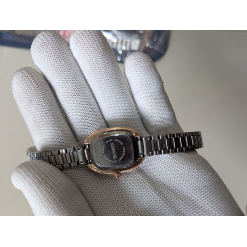 Picture of Luxury Women's Watch featuring an elegant pink oval dial and durable silver stainless steel band, perfect for professional office wear or casual outings, providing reliable Japanese quartz movement and style.-Multicolor