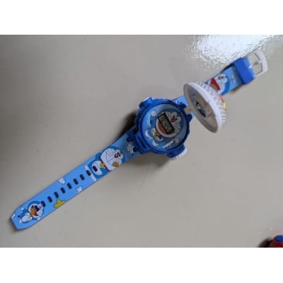 Picture of Doraemon cartoon character digital projector watch for kids featuring twenty-four different rotatable projection images high quality silicone strap adjustable wristband perfect birthday gift idea for boys girls and toddlers online shopping.-Blue