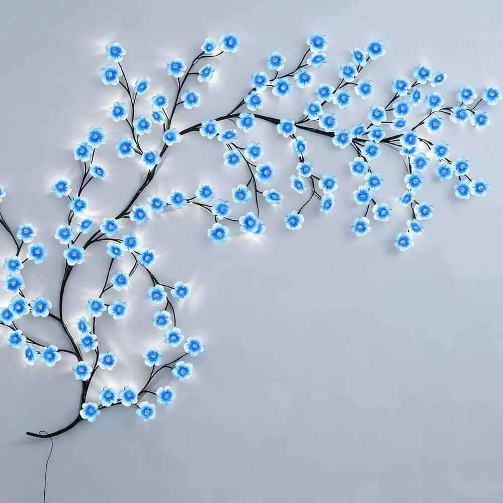 Picture of Blue Cherry Blossom LED Tree Branch Lights for Wall,8 Modes Cherry Blossom Lights with 144 LED,Remote,Timer,Cherry Blossom LED Vine Fairy Lights,Decorations for Bedroom,Wall Art,Christmas - Blue