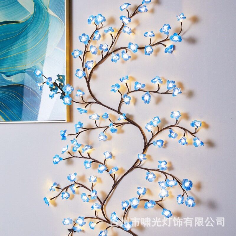 Picture of Blue Cherry Blossom LED Tree Branch Lights for Wall,8 Modes Cherry Blossom Lights with 144 LED,Remote,Timer,Cherry Blossom LED Vine Fairy Lights,Decorations for Bedroom,Wall Art,Christmas - Blue