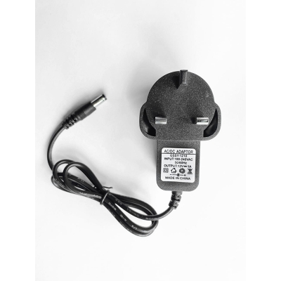 Picture of TP-Link brand power adapter designed for use with wireless routers.-Black