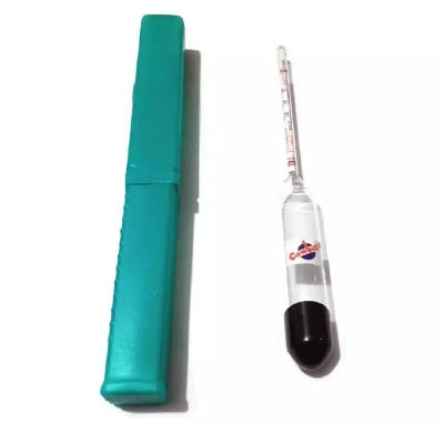 Picture of Cowbell lactometer for milk purity test  Green