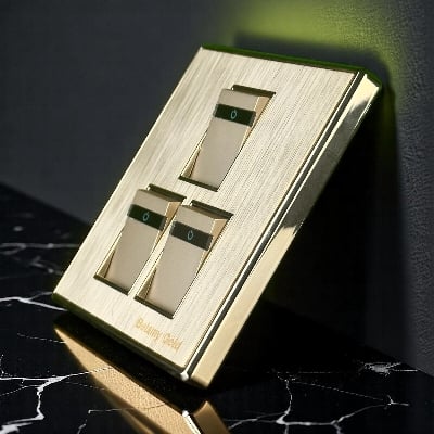 Picture of Belamy Golden 3 Gang 1 Way Socket | BE-135-SW-Gold