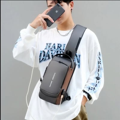Picture of Men’s Waterproof Anti-Theft Chest Sling Bag – USB Charging Crossbody Shoulder Bag for Travel, Work & Daily Use -  Black