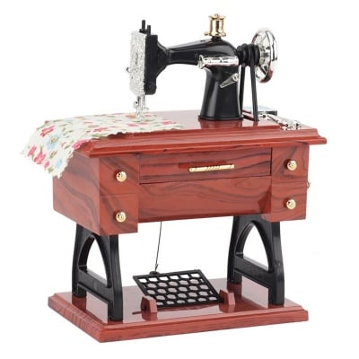 Picture of Musicial sewing machine for gift | Low price gift item for girl friend | Perfect Gift Item | Ideal for Tailoring, DIY, and Home Use | Compact & Durable Design | Great Gift for Mothers, Designers & Beginners | Buy Best Sewing Machine Onlie